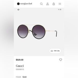 Gucci 
GG0061S oversized round sunglasses gold and black